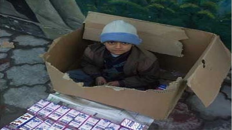 طفل ايراني يعيش في كرتون-min