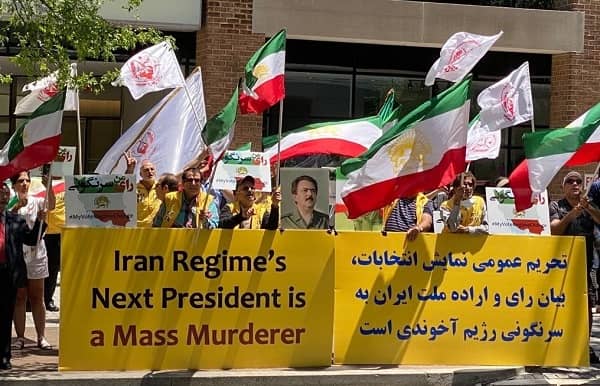 Friday, June 18, 2021: WASHINGTON, DC- Iranians supporters of the People's Mojahedin of Iran Organization (MEK/PMOI) and the National Council of Resistance of Iran (NCRI), held a rally on Friday against the sham election of the Iranian regime.
