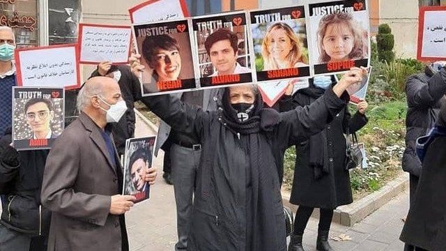 Iran, Tehran, November 21, 2021: Families of the victims of the plane crash held a protest rally in front of the regime's court.