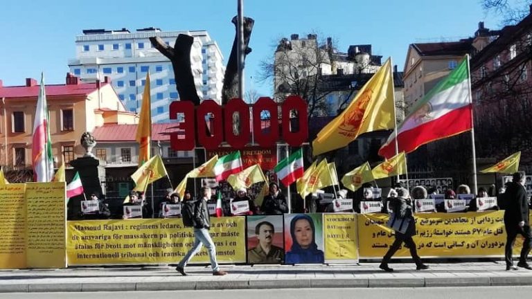 Stockholm, Sweden: Freedom-loving Iranians, supporters of the People’s Mojahedin Organization of Iran (PMOI/MEK), Demonstrated in Front of the Stockholm District Court, Seeking Justice for the 1988 Massacre Martyrs - February 18, 2022