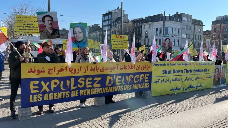 Iranian resistance supporters rally on Friday, March 4, 2022, in front of the Antwerp Court of Appeal in Belgium
