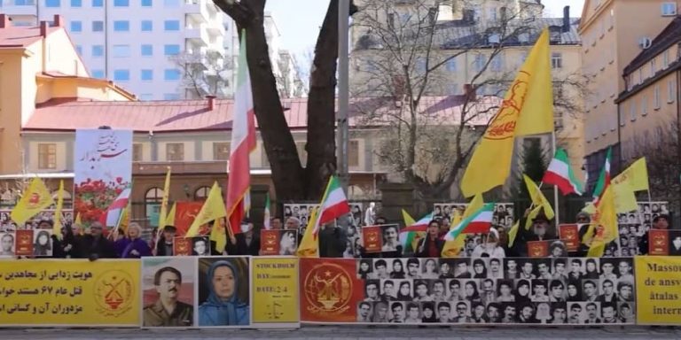 Sweden, March 24, 2022: Freedom-loving Iranians, supporters of the People's Mojahedin Organization of Iran (PMOI/MEK), rally in front of Stockholm court. MEK supporters are seeking justice for 30,000 political prisoners executed by the mullahs’ regime in the1988 massacre.