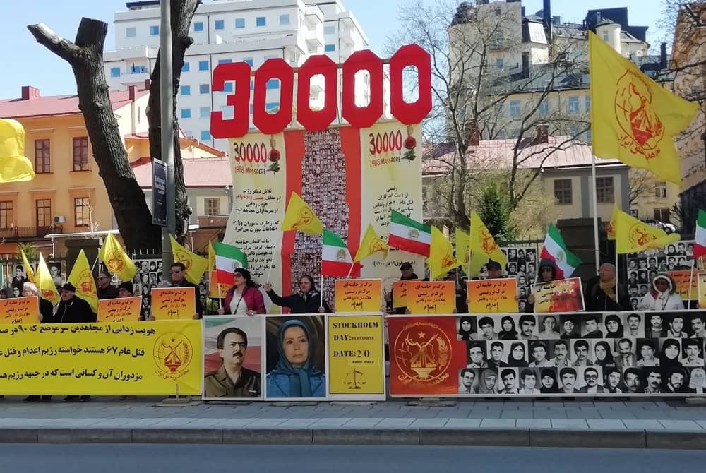 Sweden, Stockholm, April 20, 2022: Freedom-loving Iranians, supporters of the People's Mojahedin Organization of Iran (PMOI/MEK), rallied outside the court session of Iran's regime executioner Hamid Noury for justice.