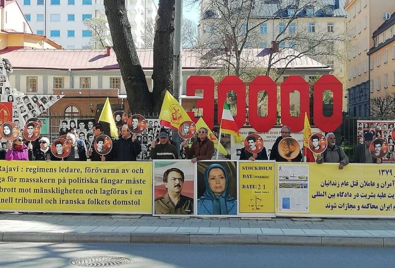 Sweden, Stockholm, April 21, 2022: Freedom-loving Iranians, supporters of the People's Mojahedin Organization of Iran (PMOI/MEK), rallied outside the court session of Iran's regime executioner Hamid Noury for justice.