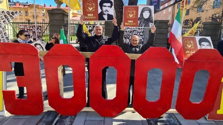 Stockholm, April 25, 2022: Freedom-loving Iranians, supporters of the People's Mojahedin Organization of Iran (PMOI/MEK), rallied outside the court session of Iran's regime executioner Hamid Noury for justice.