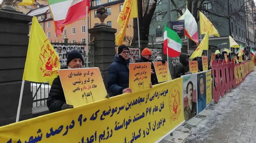 Sweden, April 5, 2022: In snowy and cold weather, freedom-loving Iranians, supporters of the People's Mojahedin Organization of Iran (PMOI/MEK), demonstrated in front of Stockholm court.