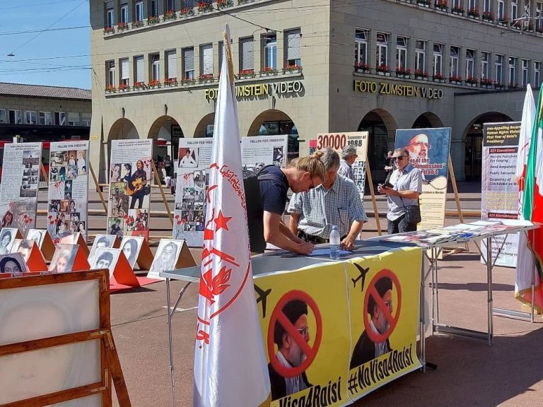 Bern, August 25, 2022: Freedom-loving Iranians and supporters of the People's Mojahedin Organization of Iran (PMOI/MEK) held a photo exhibition in memory of the martyrs of Iran's 1988 massacre. Iranian Resistance supporters in Bern demanded the US Government not to grant a visa for Ebrahim Raisi because of his role in the 1988 massacre of over 30,000 political prisoners in Iran and more than 1500 protesters killed in the November 2019 uprising.
