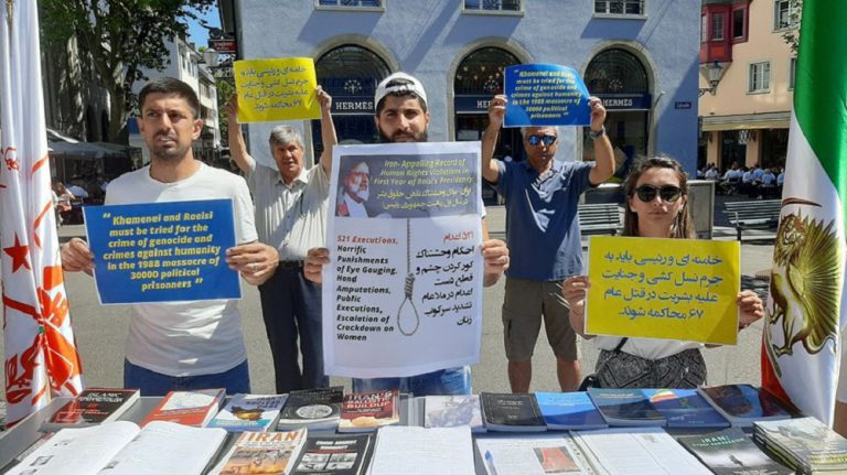 Zurich, Switzerland, August 9, 2022: Freedom-loving Iranians, supporters of the People's Mojahedin Organization of Iran (PMOI/MEK) held a rally and book exhibition and called for the trial of the mullahs' regime leaders for crimes against humanity.