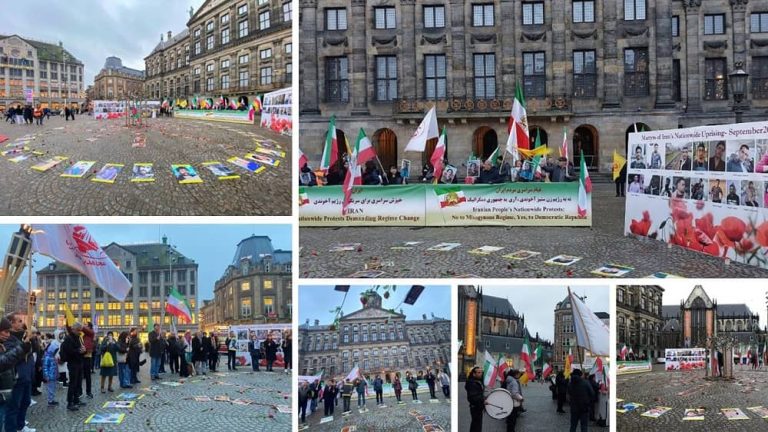 Amsterdam, the Netherlands—November 18, 2022: Freedom-loving Iranians and supporters of the People's Mojahedin Organization of Iran (PMOI/MEK) held a rally in Dam Square in solidarity with the Iranian people's uprising. They also commemorated the anniversary of the November 2019 uprising in Iran.