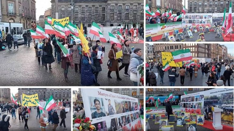 Amsterdam, the Netherlands—November 26, 2022: Freedom-loving Iranians and supporters of the People's Mojahedin Organization of Iran (PMOI/MEK) held a rally in Dam Square in solidarity with the Iranian people's uprising.