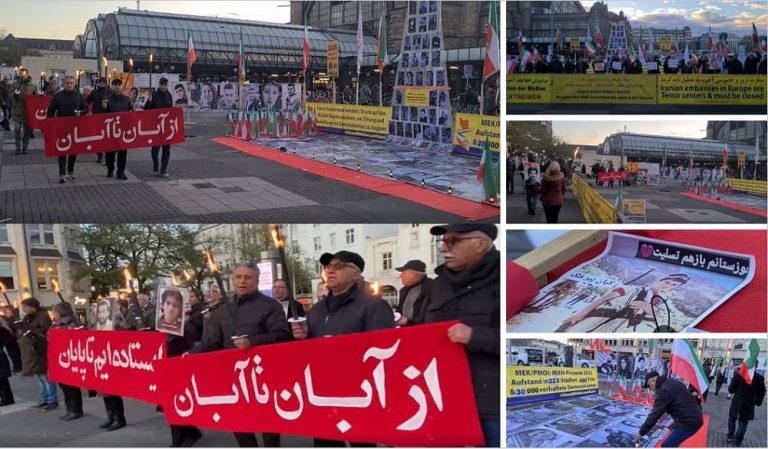 Hamburg, Germany—November 18, 2022: Freedom-loving Iranians and supporters of the People's Mojahedin Organization of Iran (PMOI/MEK) held a rally in solidarity with the Iranian people's uprising. They also commemorated the anniversary of the November 2019 uprising in Iran.