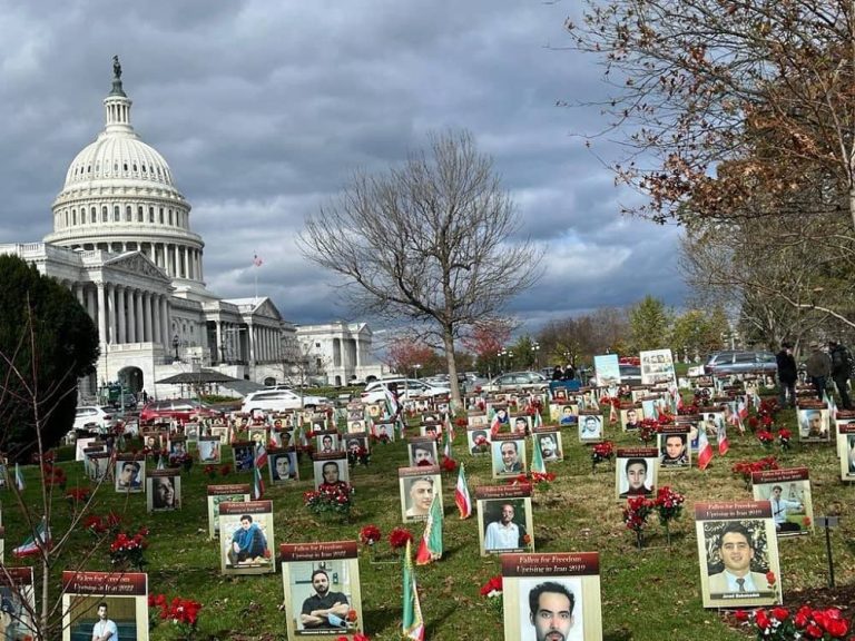 Washington, DC—November 16, 2022:Iranian-American community and supporters of the Iranian Resistance (NCRI and MEK) continued to rally and held a photo exhibition and Candlelight Vigil outside the US Capitol, supporting the nationwide Iran protests.