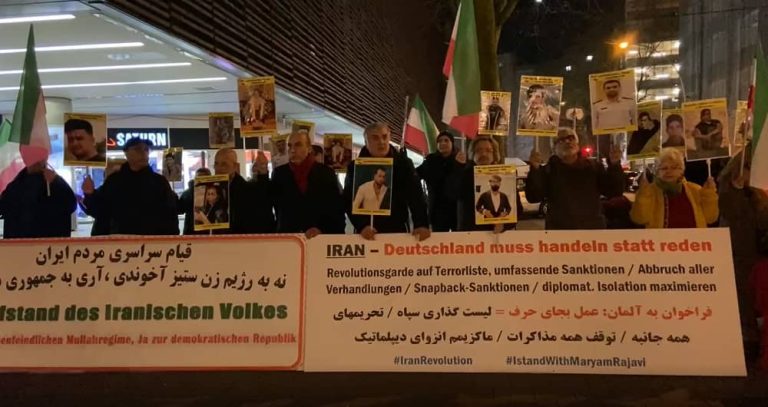 Hamburg, Germany—December 27, 2022: Freedom-loving Iranians and supporters of the People's Mojahedin Organization of Iran (PMOI/MEK) gathered to commemorate the martyrs of the nationwide Iranian Revolution. They also expressed their solidarity with the Iranian people's uprising.