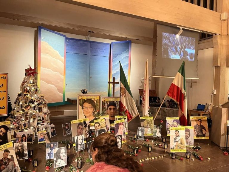 Stockholm, Sweden—December 24, 2022: Freedom-loving Iranians and supporters of the People's Mojahedin Organization of Iran (PMOI/MEK) on the eve of Christmas, attended churches and gathered to commemorate the martyrs of the nationwide Iranian Revolution.