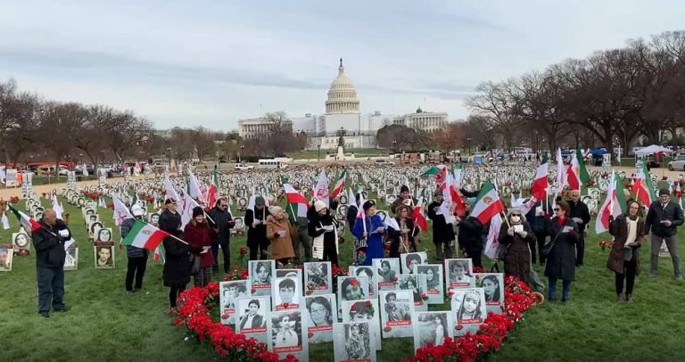 Washington, DC—December 14, 2022: Supporters of the People's Mojahedin Organization of Iran (PMOI/MEK) held a rally and photo exhibition to protest against the criminal execution of the young protester, Majidreza Rahnavard in front of the US Congress.