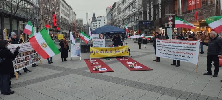 Berlin, Germany—February 3, 2023: Freedom-loving Iranians and supporters of the People's Mojahedin Organization of Iran (PMOI/MEK) held a rally in solidarity with the Iranian people's uprising.