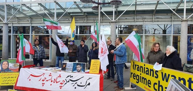Heidelberg, Germany—March 11, 2023: Freedom-loving Iranians and supporters of the People's Mojahedin Organization of Iran (PMOI/MEK) held a rally in solidarity with the Iranian people's uprising.
