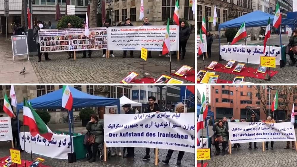 Bremen, Germany—April 19, 2023: Freedom-loving Iranians and supporters of the People's Mojahedin Organization of Iran (PMOI/MEK) held a rally in support of the nationwide Iranian Revolution.