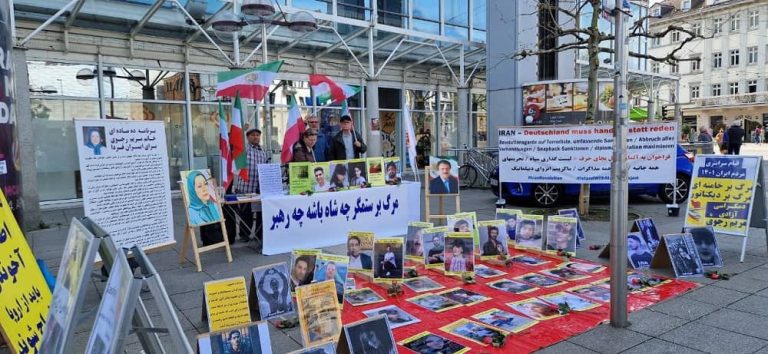 Heidelberg, Germany—April 20, 2023: Freedom-loving Iranians, supporters of the People's Mojahedin Organization of Iran (PMOI/MEK) held a rally in support of the Iranian Revolution.