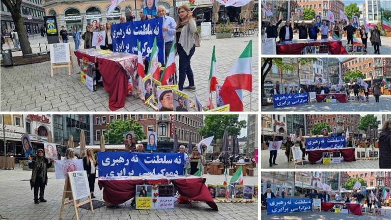 Aachen, Germany—May 13, 2023: Supporters of the People's Mojahedin Organization of Iran (PMOI/MEK) and freedom-loving Iranians gathered to show their solidarity with the ongoing Iranian Revolution. They Also Condemned Recent Brutal Executions in Iran by the Mullahs' Regime.