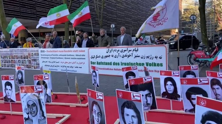 Hamburg—May 8, 2023: Supporters of the People's Mojahedin Organization of Iran (PMOI/MEK) and freedom-loving Iranians gathered to show solidarity with the ongoing Iranian Revolution. They commemorated the Iranian uprising martyrs with a photo exhibition.