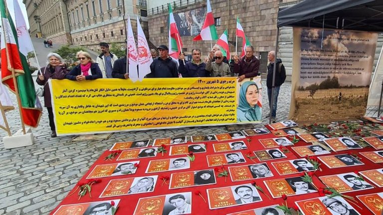 Stockholm, Sweden—August 10, 2023: Freedom-loving Iranians and supporters of the People’s Mojahedin Organization of Iran (PMOI/MEK) held a rally and photo exhibition in front of the Swedish Parliamnet and demanded the trial of Ali Khamenei (Supreme leader of the mullahs' regime) for crimes against humanity, in an international court. They expressed strong support for the MEK leadership.