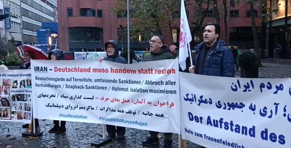 Bremen, Germany—November 11, 2023: Freedom-loving Iranians and supporters of the People’s Mojahedin Organization of Iran (PMOI/MEK) organized a rally in solidarity with the Iranian Revolution and victims of of terror, torture and execution by the mullahs' regime. This demonstration served as a tribute to the martyrs of the nationwide Iranian uprising.