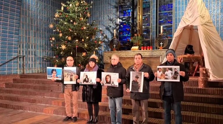 December 23, 2023: On the Eve of Christmas, freedom-loving Iranians and supporters of the People’s Mojahedin Organization of Iran (PMOI/MEK) attended a prayer ceremony at a church in Berlin, displaying pics of the martyrs of the Iranian Revolution.