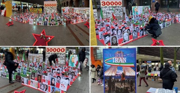 Hamburg , Germany—December 16, 2023: Freedom-loving Iranians and supporters of the People’s Mojahedin Organization of Iran (PMOI/MEK) organized a rally and exhibition in solidarity with the Iranian Revolution.
