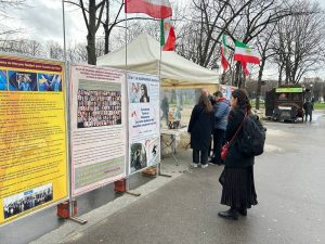 Paris, France—February 14, 2024: Freedom-loving Iranians and supporters of the People’s Mojahedin Organization of Iran (PMOI/MEK) organized an exhibition in solidarity with the Iranian Revolution.