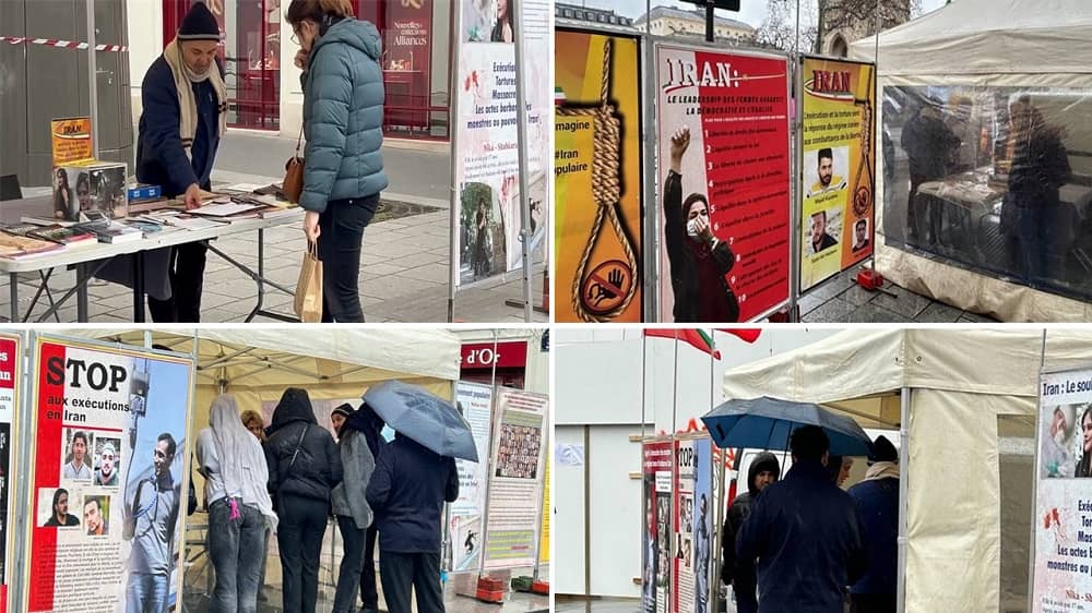 Paris, France—February 21, 2024: Freedom-loving Iranians and supporters of the People’s Mojahedin Organization of Iran (PMOI/MEK) organized an exhibition in solidarity with the Iranian Revolution.