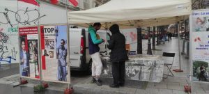 Paris, France—March 23, 2024: Freedom-loving Iranians and supporters of the People’s Mojahedin Organization of Iran (PMOI/MEK) organized an exhibition and book table in solidarity with the Iranian Revolution.