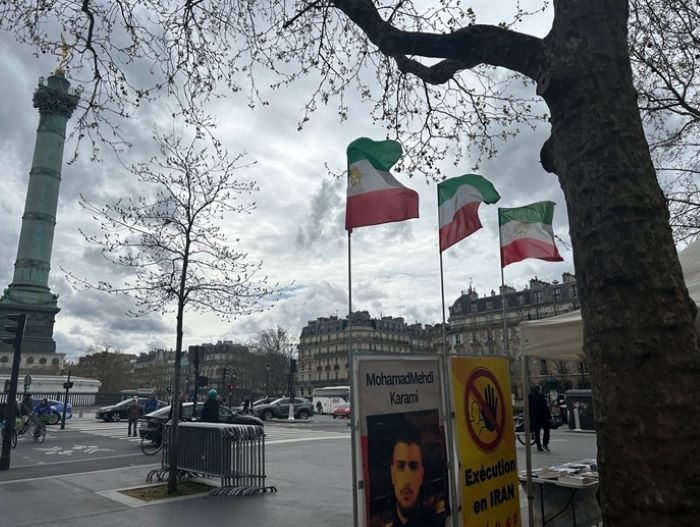 تقرير مصور - باريس - طاولة كتب ومعرض لصور شهداء الانتفاضة الإيرانية  