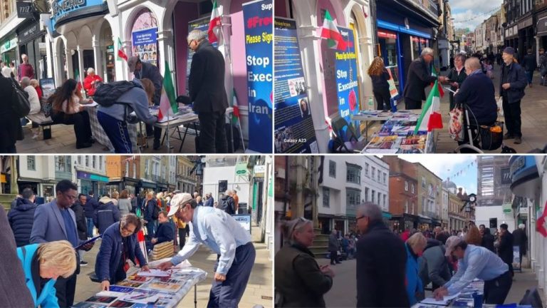 Winchester, England—March 30, 2024: Freedom-loving Iranians, and supporters of the People’s Mojahedin Organization of Iran (PMOI/MEK) organized a book exhibition, and petition collection in support of the Iranian Revolution, political prisoners, and to stop torture and executions.