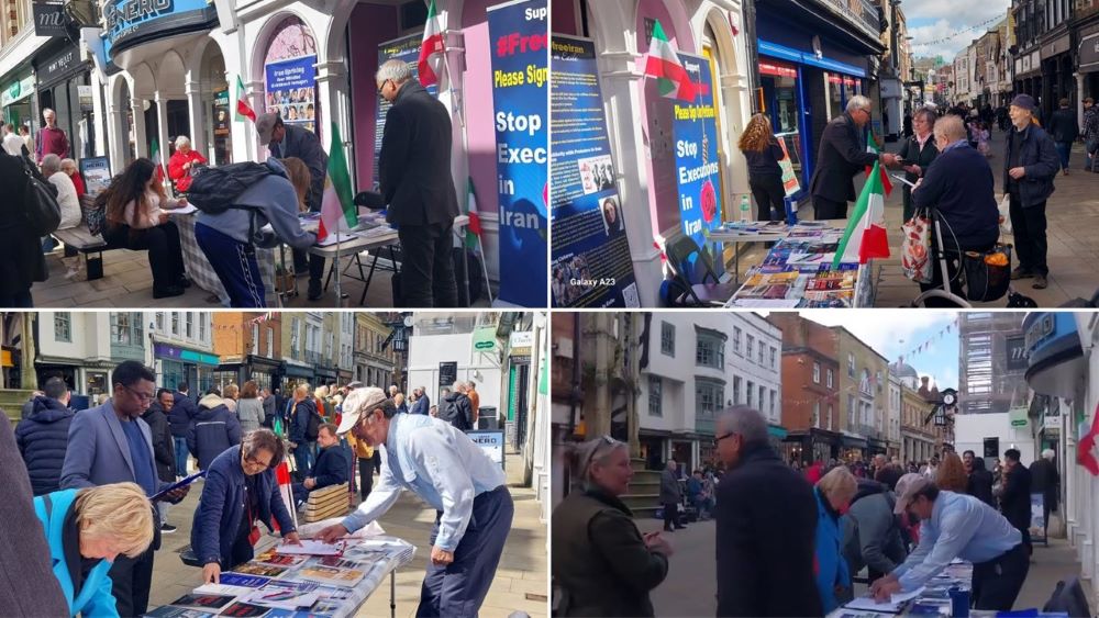 Winchester, England—March 30, 2024: Freedom-loving Iranians, and supporters of the People’s Mojahedin Organization of Iran (PMOI/MEK) organized a book exhibition, and petition collection in support of the Iranian Revolution, political prisoners, and to stop torture and executions.