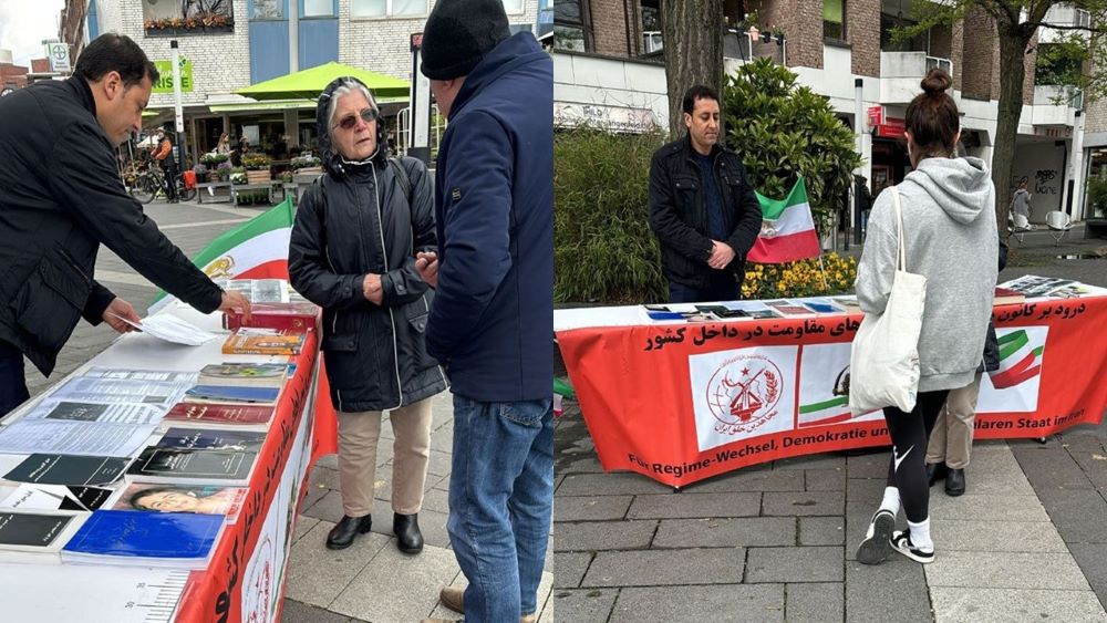 Langenfeld, Germany—April 25, 2024: Freedom-loving Iranians and supporters of the People’s Mojahedin Organization of Iran (PMOI/MEK) held a book table and exhibition to express solidarity with the Iranian Revolution.