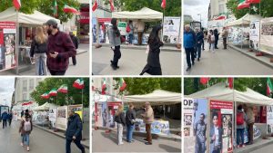 Paris, France—April 20, 2024: Freedom-loving Iranians and supporters of the People's Mojahedin Organization of Iran (PMOI/MEK) organized an exhibition and book display in solidarity with the Iranian Revolution.