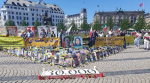 Copenhagen, Denmark—May 18, 2024: Freedom-loving Iranians and supporters of the People’s Mojahedin Organization of Iran (PMOI/MEK) organized a rally and exhibition to express solidarity with the Iranian Revolution, while also protesting against the increasing wave of executions by the Iranian regime.