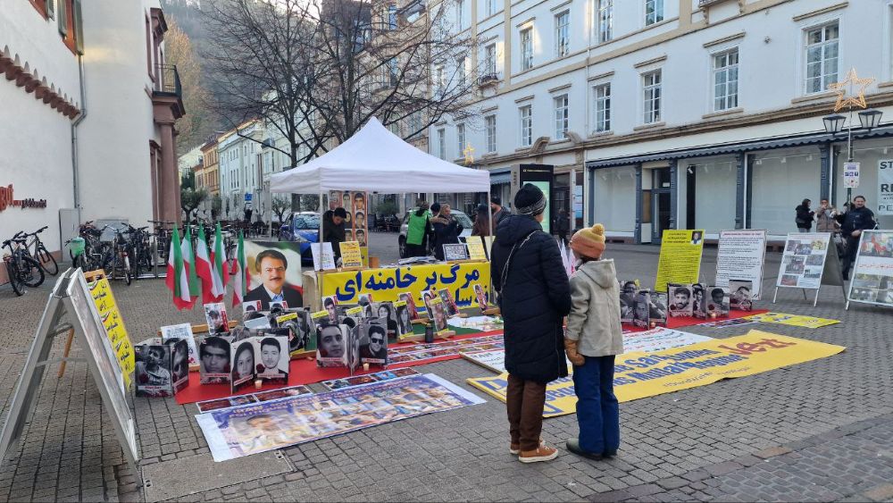 MEK supporters in Heidelberg protest executions, demand freedom for political prisoners.
