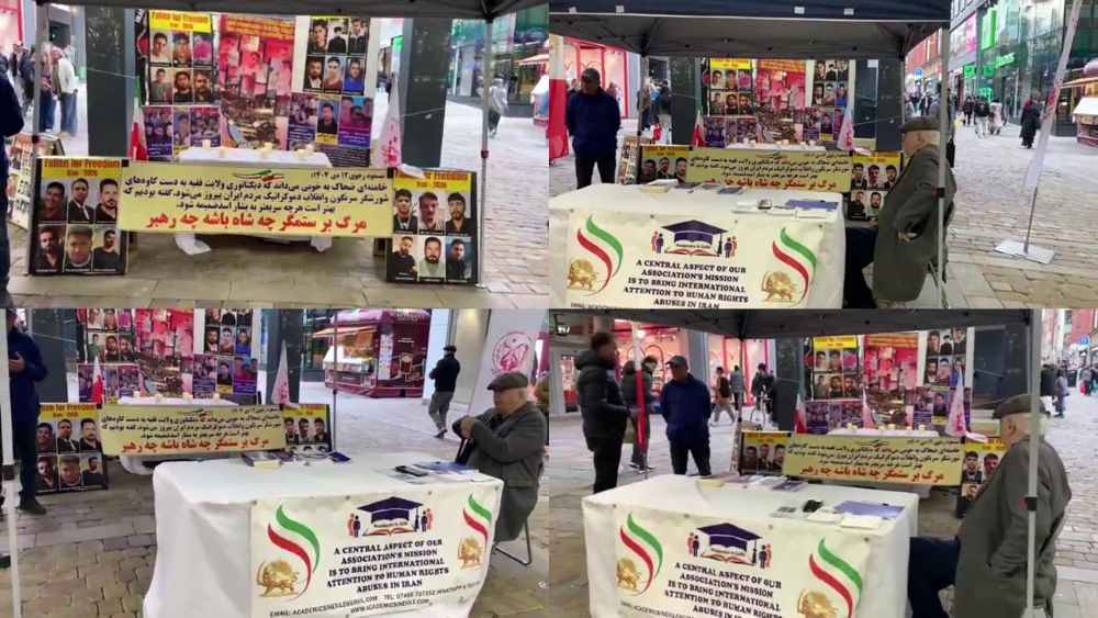 Honoring Iran uprising martyrs at Manchester book and photo exhibition.