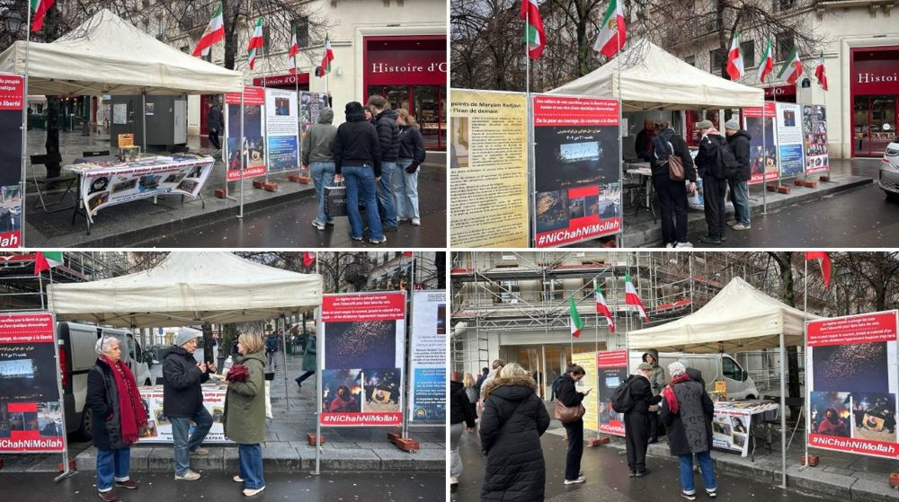 PMOI supporters hold a photo exhibition in Paris in solidarity with Iran’s nationwide uprising.