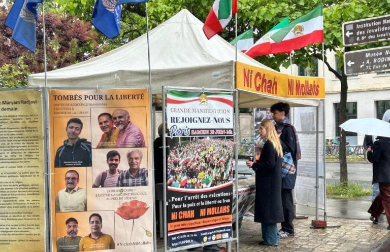 MEK supporters held an exhibition in Paris, denouncing executions in Iran and calling for a democratic republic ahead of the June 20 rally.