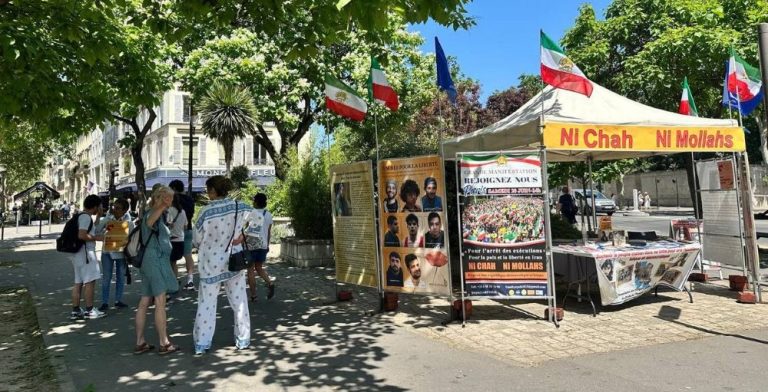 Supporters of the MEK held an exhibition in Paris condemning executions in Iran and urging participation in the major June 20 rally for a democratic republic.