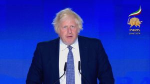 Boris Johnson criticizes France rally ban, urges support for Iran’s democratic movement and amplifying voices of freedom.