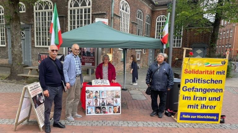 MEK supporters held a book table in Elmshorn, calling for mass participation in the June 20 Free Iran gathering in Paris.