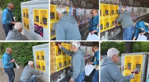 MEK supporters in Münster put up posters to promote the Paris Free Iran Rally on June 20.