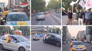 A car convoy moves through Berlin as supporters welcome the UK's designation of the IRGC as a terrorist organization.