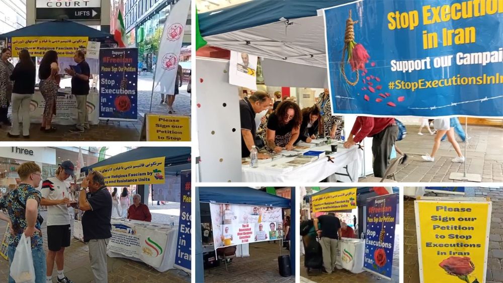 MEK supporters gather at a book table and photo exhibition in Manchester to raise awareness of Iran's human rights abuses.