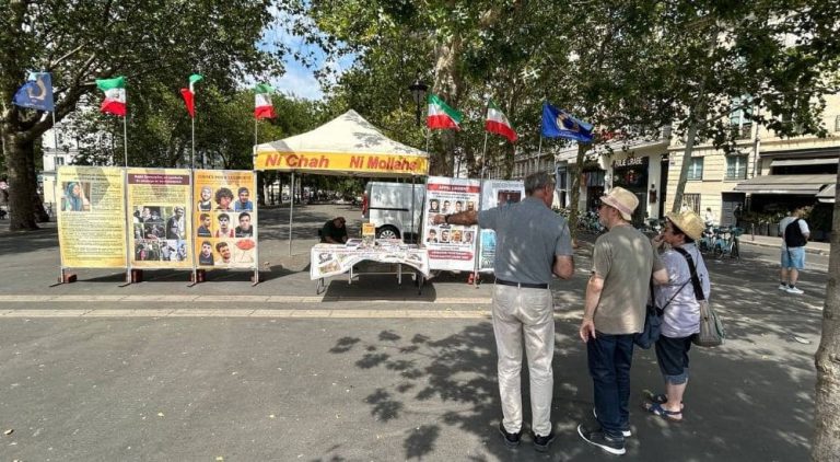 MEK supporters in Paris held an exhibition condemning executions in Iran and calling for a democratic republic.