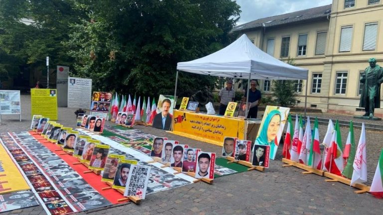 PMOI supporters in Heidelberg commemorate the victims of Iran’s 1988 massacre and condemn ongoing executions.